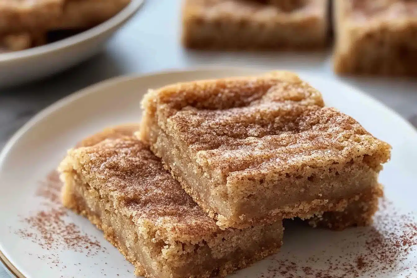 Delicious homemade Snickerdoodle Bars topped with cinnamon sugar
