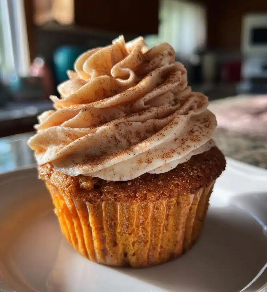 pumpkin cupcakes with cinnamon cream cheese frosting