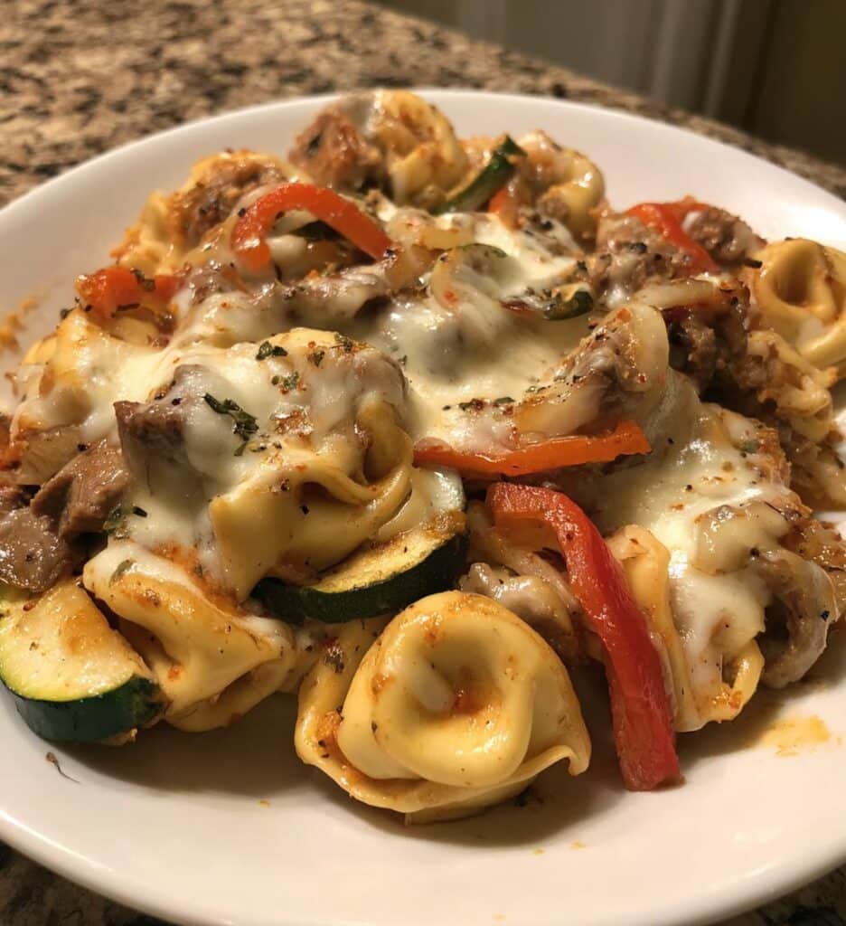 cheesesteak tortellini in rich provolone sauce