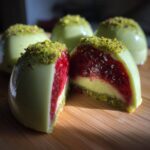 pistachio raspberry cheesecake domes