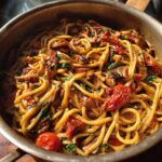 sun dried tomato and mushroom pasta in garlic and basil sauce